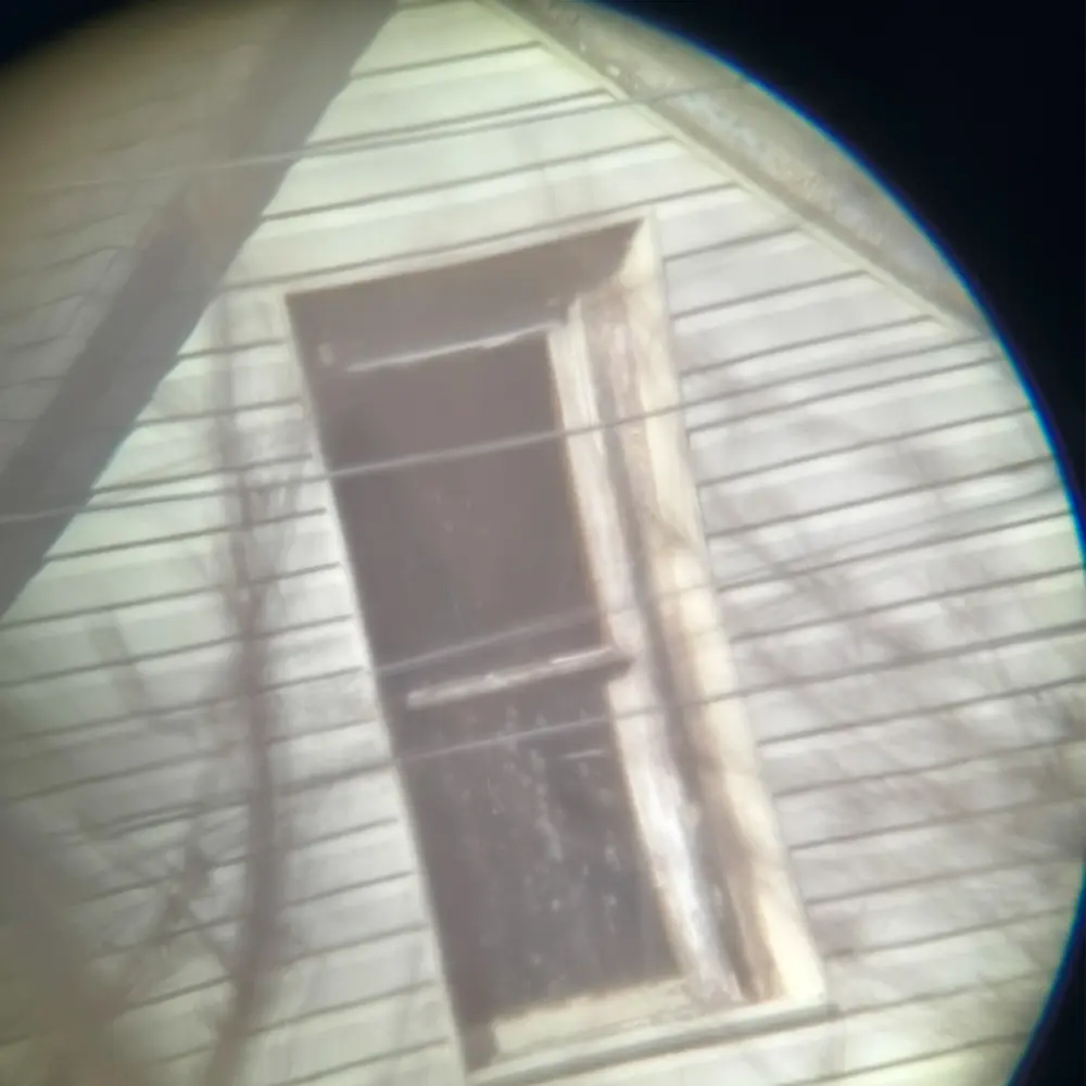 Viewing a window of a distant building through the eyepiece while calibrating the telescope