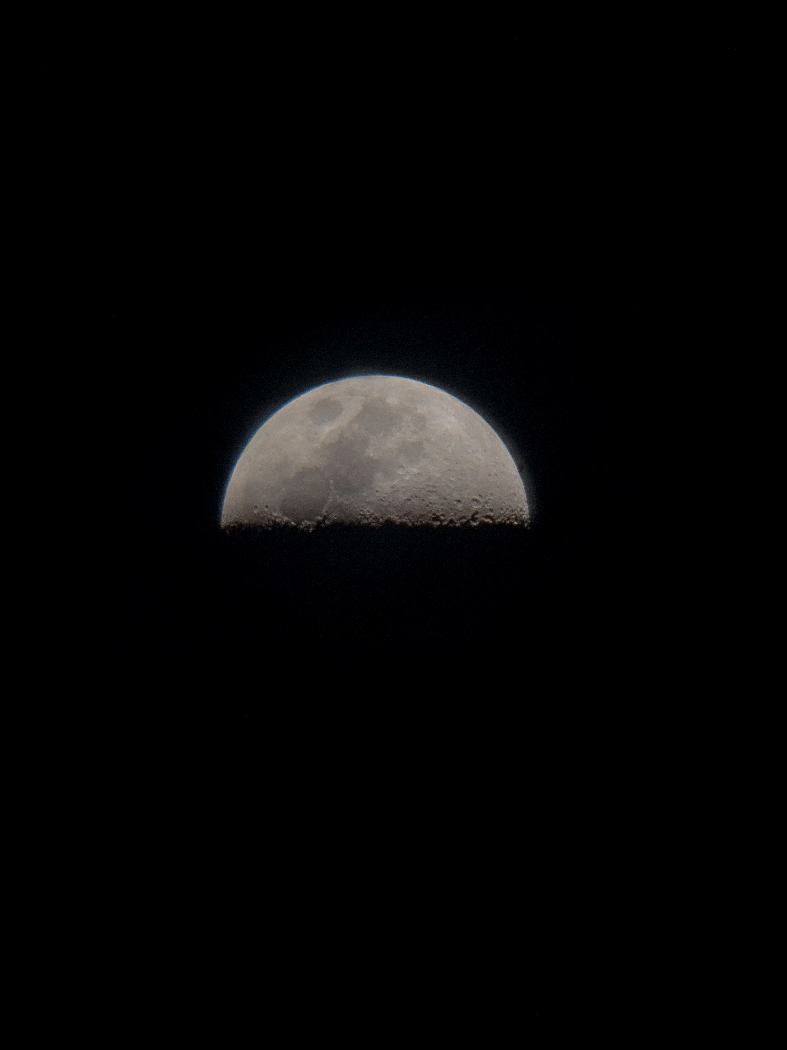 A picture of the moon, half full